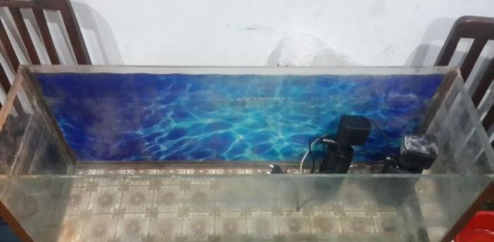 Akvarium 85sm eni 26sm. Icindeki aksesuarlar var. Hava temizliyen ve d