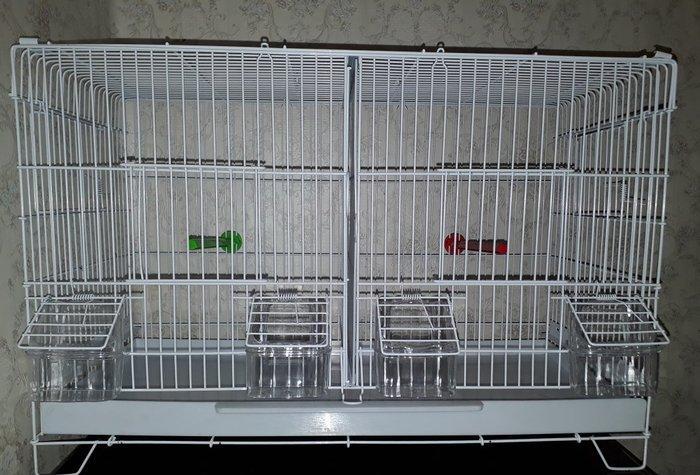 Quslarcun ortadan iki hisseye bolunen boyuk qefes tezedir her bir akse